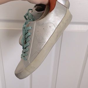 Shu Shop shoes with teal laces